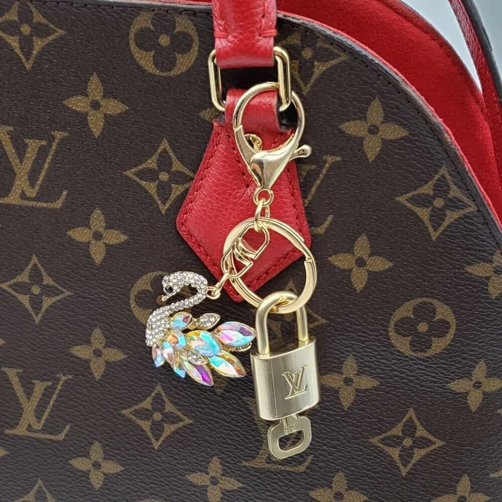 Authentic Louis Vuitton Gold Padlock & Key with Unbranded Swan Keychain - Picture 6 of 8